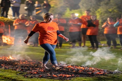 one woman doing firewalking